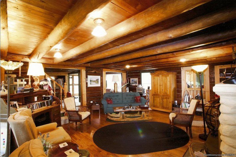 Sunny Rock B&B, Cozy Livingroom with riverstone firplace | Sunny Rock Bed & Breakfast Haliburton Highlands ON | Image #14/23 | 