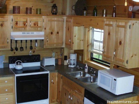 MacLeod cabin kitchen | Image #3/19 | Luxury Log Cabin Rentals with Hot Tub