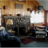 The Lodge on Otter Tail Lake Relax by the historic fireplace in our L