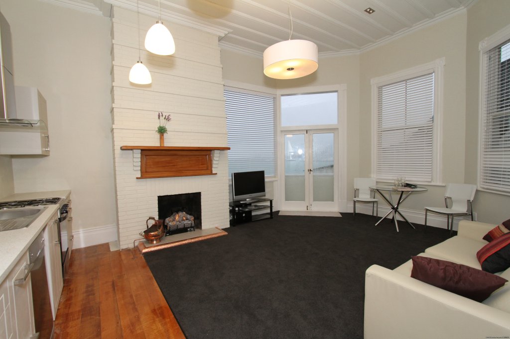 French doors, log fire in No 2 Apartment | Auckland Number One  House Homestay | Image #8/24 | 