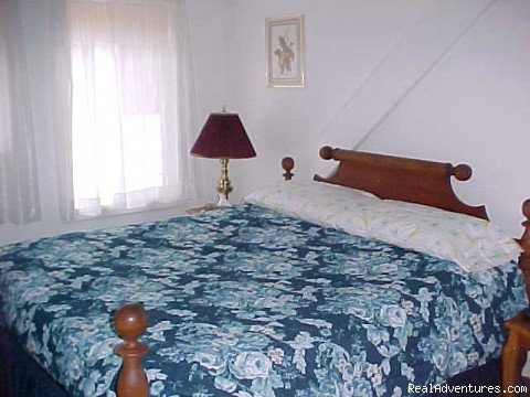 Master Bedroom | Pleasant View Cottage and Caboose | Image #2/6 | 