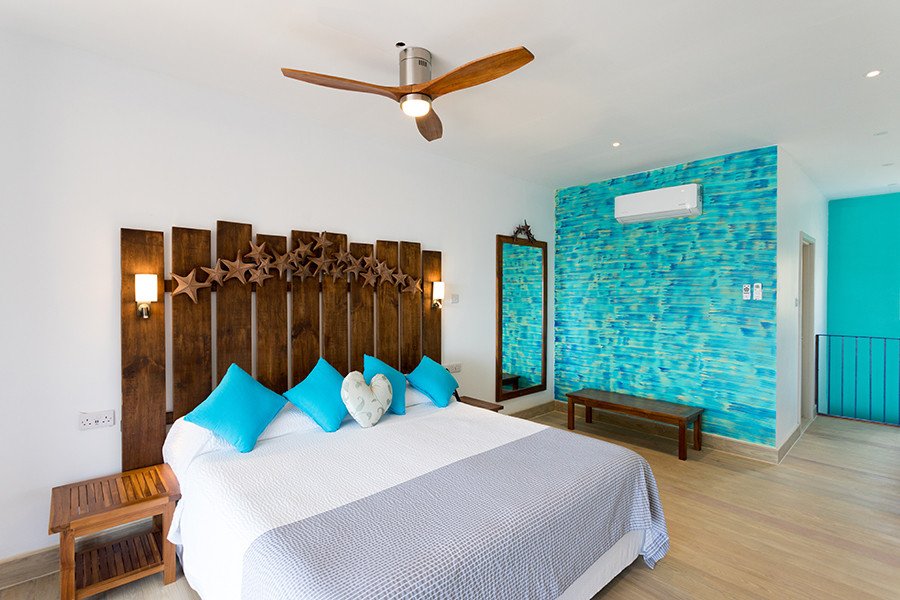 Cocoa Pod Suite Bedroom | True Blue Bay Resort - Grenada | Image #11/11 | 