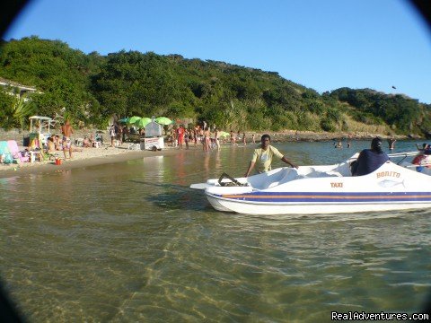 Azeda beach with view of a water taxi | Buzios Internacional Apart Hotel | Image #8/17 | 