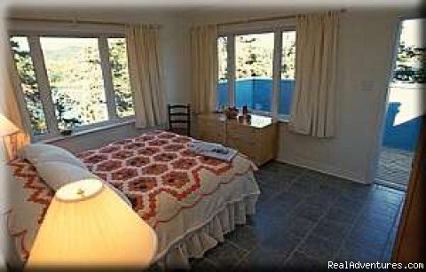 main bedroom, with its own balcony  | Solitude & Stunning Views on 2 Ocean Beaches | Image #2/3 | 