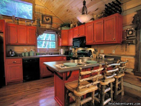 Gourmet kitchen (Cherokee Lodge) | Creekside luxury log cabins in the Smokies | Image #16/17 | 