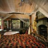 Creekside luxury log cabins in the Smokies Romantic bedroom with fireplace and Jacuzzi (Slippery Rock)