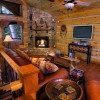 Creekside luxury log cabins in the Smokies Upscale amenities include flat screen TVs (Cherokee Lodge)