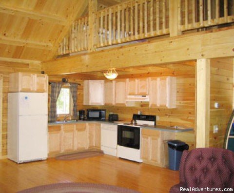 Kitchen | Escape to Maine in a Cozy Log Cabin | Image #3/8 | 
