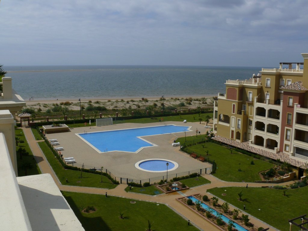 View to The Pools and Ocean | Beautiful Beachside Luxury Penthouse | Isla Canela, Spain | Vacation Rentals | Image #1/7 | 