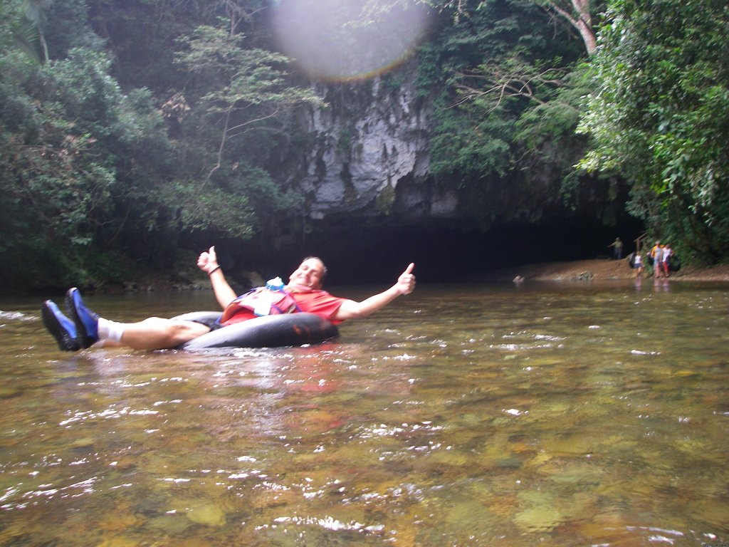Guest enjoying himself on the Cave Tubing Tour | Belize Archaeology, Caves, Rainforest, Reef Tours | Image #7/10 | 