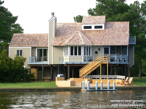 Fabulous 4 B.R. 4 Bath home in the tranquil private Oyster Bay Community. Crabbing and boating from your private dock. Enjoy Three Sun Decks; screened porch; Fantastic water-views; Fireplace and more. Google us at ponyisland  Email for correct quote!