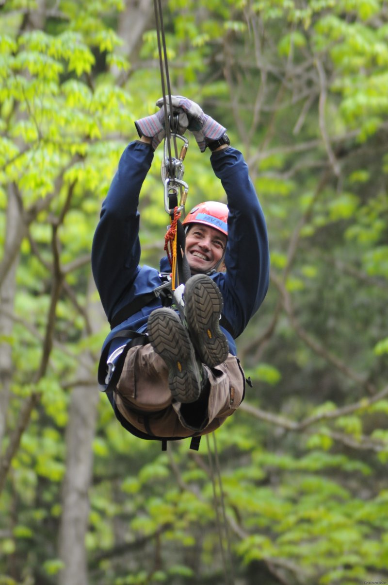 Zipping through the canopy above our basecamp | Rafting and Zip Line Adventures in Massachusetts | Image #15/15 | 