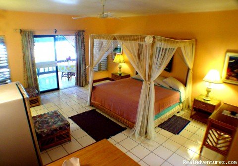 Veranda suite bedroom | Nirvana On The Beach, Negril Jamaica | Image #6/22 | 