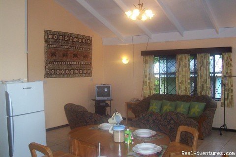 Open plan living/kitchen/dining area | Suva Fiji Holiday Home | Image #2/2 | 