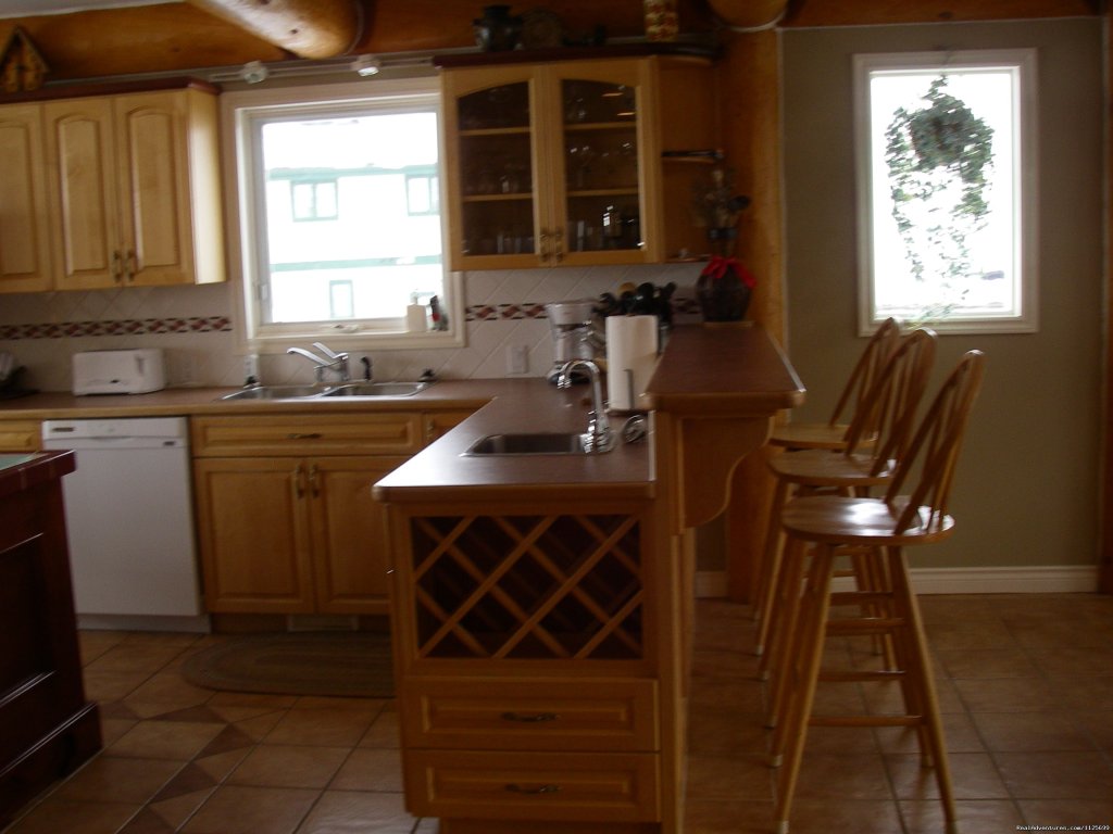 Kitchen and bar area | Sun Peaks Resort Private Post &Beam Chalet | Image #12/23 | 