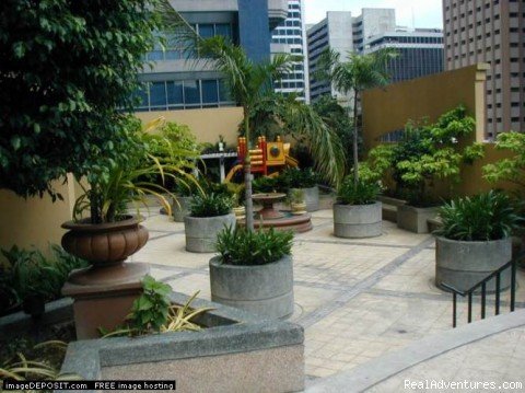 Kids playground garden area | 2 Holiday Executive studios new complex Makati | Image #5/16 | 
