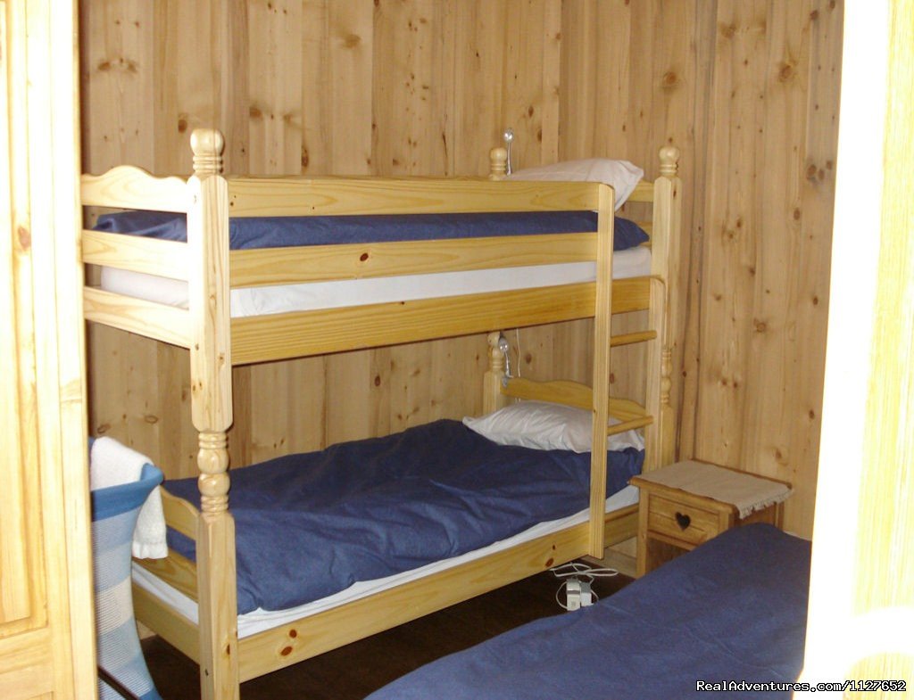 Apartment bedroom with bunks and double sofa bed | Ski and Summer Breaks in La Clusaz | Image #12/13 | 
