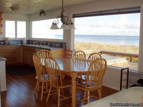 Dining and kitchen views overlooking Dungeness Bay | 3 Crabs Beach House - Private Beach & Hot Tub | Image #3/9 | 