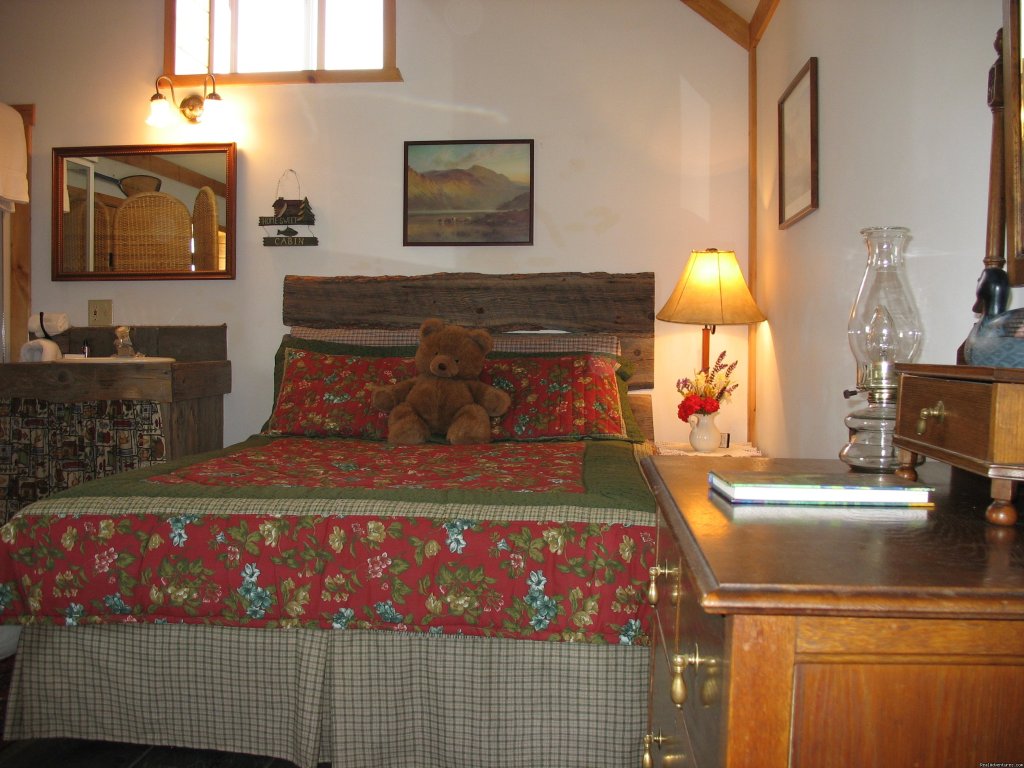 Interior of Vintage Log Cabin | Riverfront Cabins on a Private 1400 acre ranch | Image #3/19 | 