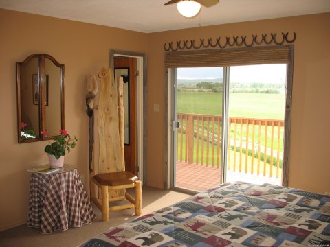 Master Bedroom in Kamloops | Riverfront Cabins on a Private 1400 acre ranch | Image #19/19 | 