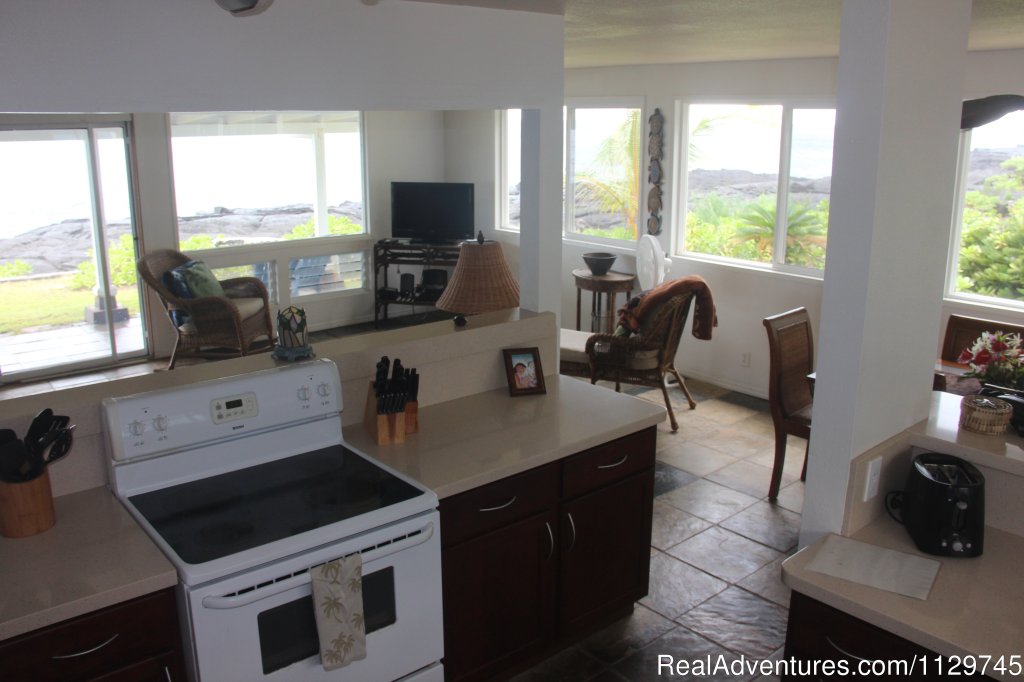 View from kitchen to living room and ocean beyond | Big Island Hawaii Vacation Homes at a Great Price | Image #7/26 | 
