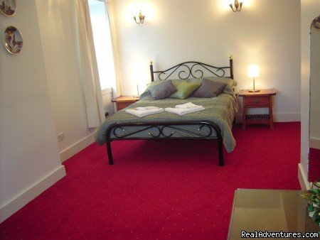 On suite bedroom | Luxury Castleoliver Coach House | Image #6/15 | 