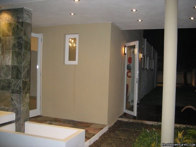 Nighttime Exterior Front Side of Villa | Ocean Villa 2 blocks from the beach in San Juan | Image #6/6 | 