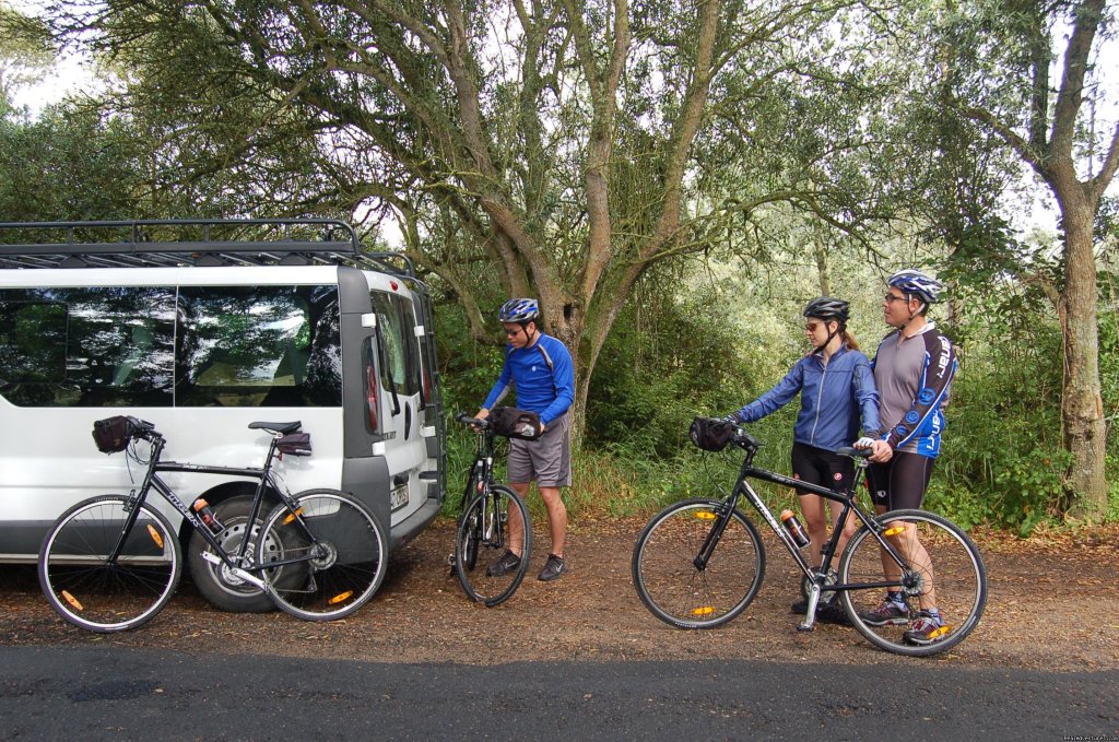 Getting some fruits and trail mix from the support van | Cycle the World Heritage Grand Tour - Luxury Tour | Image #2/3 | 