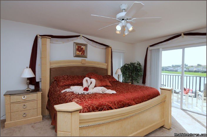 Master Suite with Balcony | Stunning Lakeside Villa, 4 Miles to Disney | Image #2/12 | 