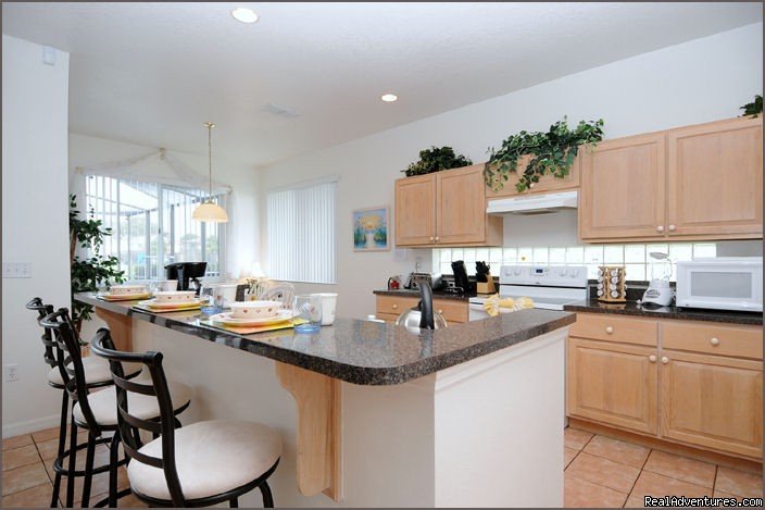 Kitchen and Breakfast Nook | Stunning Lakeside Villa, 4 Miles to Disney | Image #7/12 | 