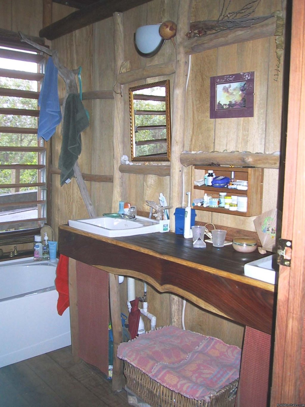 7'x9' bathroom with double sinks + slant-backed tub | Treetop Retreat- An Elemental Belizean Experience! | Image #7/7 | 