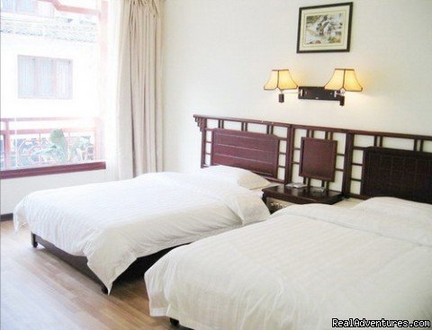 the double room  | Yangshuo Peace Family Holiday Hotel | Image #2/4 | 