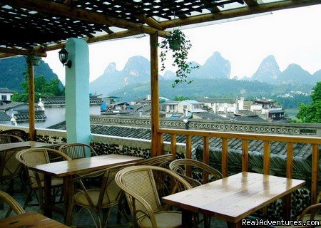 the roof top bar | Yangshuo Peace Family Holiday Hotel | Image #3/4 | 