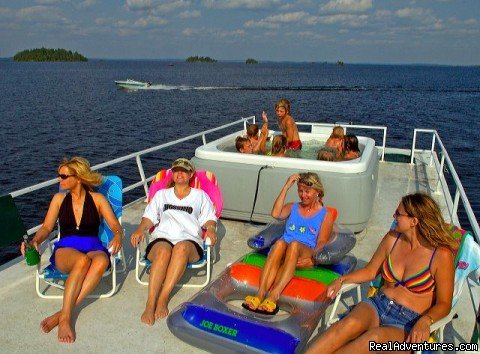 Enjoying the sun and fun on a Rainy Lake Houseboat cruise | Rainy Lake Houseboats  premier houseboat rentals | Image #5/8 | 