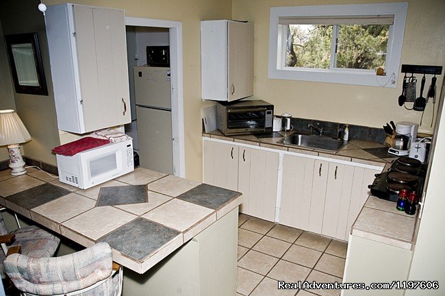 Cottage kitchen area | Enchanted Forest Accommodations Crestone CO | Image #9/19 | 