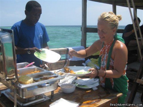 BBQ lunch on Board Mnemba Atoll snorkeling Trips. | Zanzibar Private Tours | Image #2/3 | 