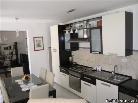 Kitchen | Lux apartment with private garden close the beach | Image #7/10 | 