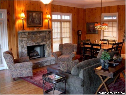 Gas Log Fireplace Den with Dining room for 8 people | Image #3/13 | Bear's Den Luxury Home Rental in Big Canoe
