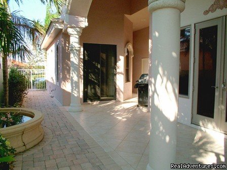 Courtyard | Luxury Sorrento Beach Villa! Spa & Pool! 50'' TV! | Image #10/17 | 
