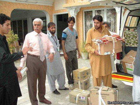 KariM Meghji supervising medicine uploads for IDPs by CDRS | NewCapeGrace Guest House,Hotels IslamabaD Pakistan | Image #25/25 | 