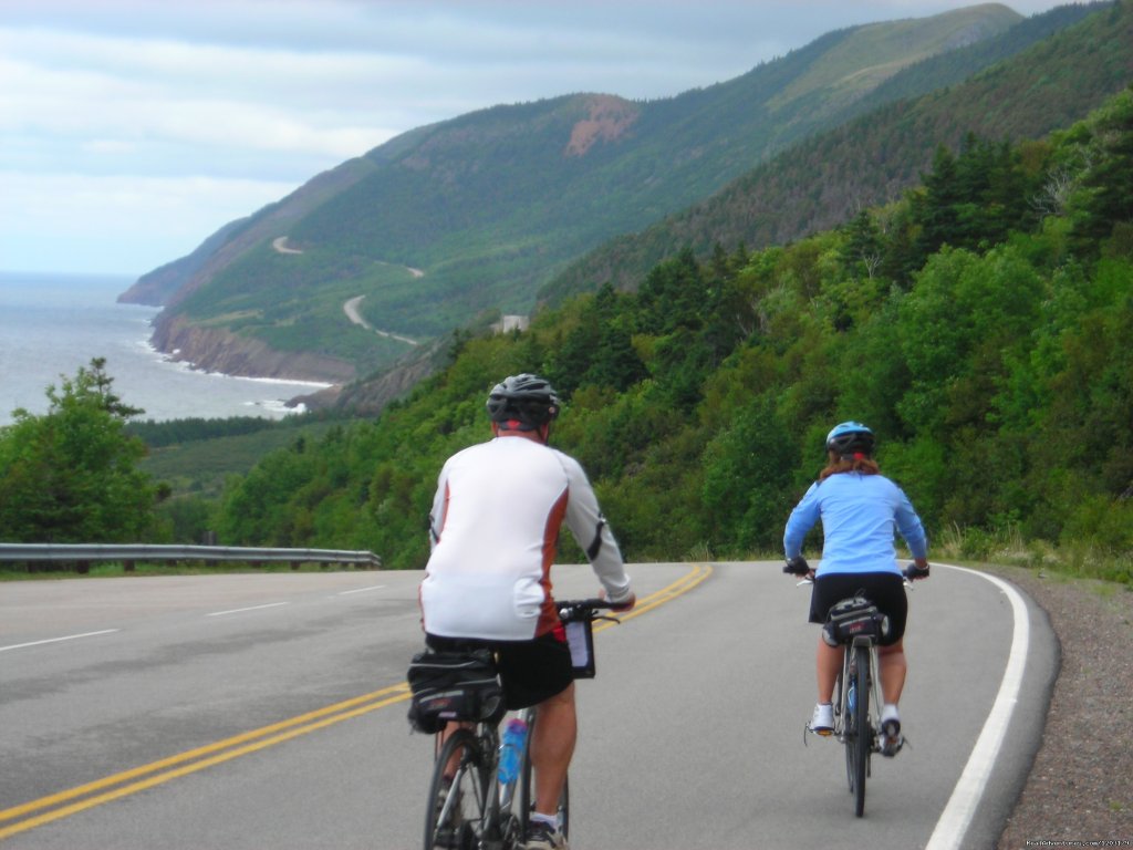 Heading into Cape Breton Highlands National Park | Cycle The Cabot Trail With Freewheeling Adventures | Cape Breton, Nova Scotia  | Bike Tours | Image #1/5 | 