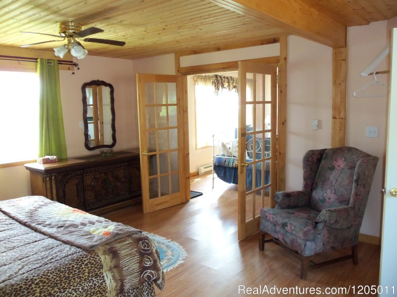 One bedroom cottage bedroom | Serenity by the Sea Guest House & Cottages | Image #4/4 | 
