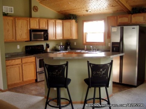 Enjoy the wooded atmosphere, abundant wildlife, and gorgeous sand beach all while lodging in one of our beautiful upscale lakeside vacation homes centrally located in the town of Sugar Camp between Eagle River and St Germain in northern Wisconsin.
