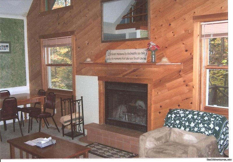 Out Post living room \ fireplace | Sunrise Lodge | Land O Lakes, Wisconsin  | Hotels & Resorts | Image #1/4 | 