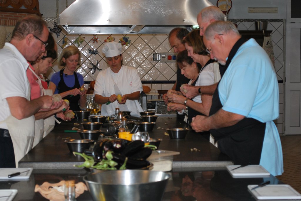 Students peeling potatoes | Cook in italy | Sorrento, Italy | Cooking Classes & Wine Tasting | Image #1/8 | 