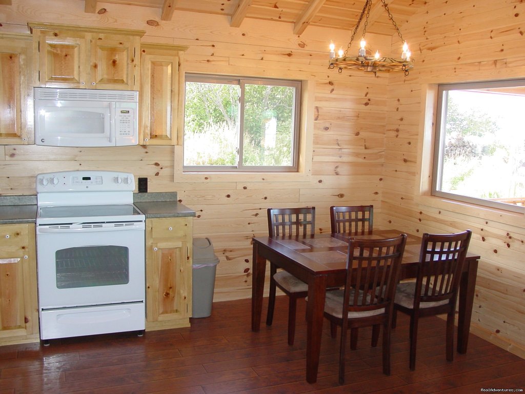 Open dining area with ocean views | Cabins on the Bluff | Image #5/6 | 