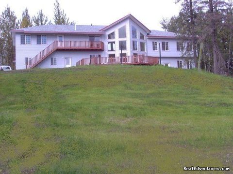 $105-155 per night:  2.2 miles from downtown Palmer. Feels remote on 15 acres of trees and trails. Indescribable view. Alaskan dÃ©cor throughout.  Private, spacious, clean, convenient, friendly. All private baths, kitchenettes, some private balconies