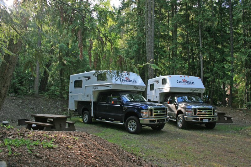 Two Truck Campers in a Wooded Campground | CanaDream RV Rentals & Sales - Halifax | Image #3/5 | 