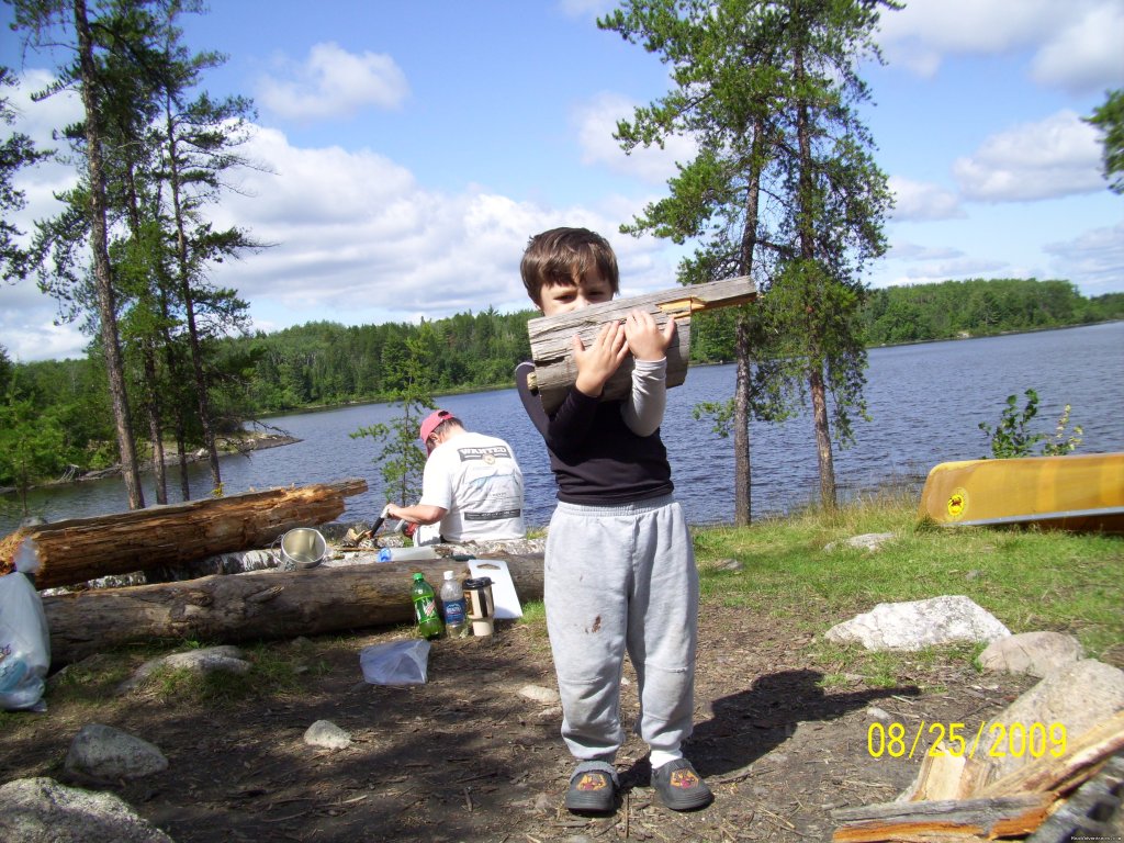 Grandson helps with wood gathering | Autumn Canoe trip with the Grandson | Image #2/3 | 