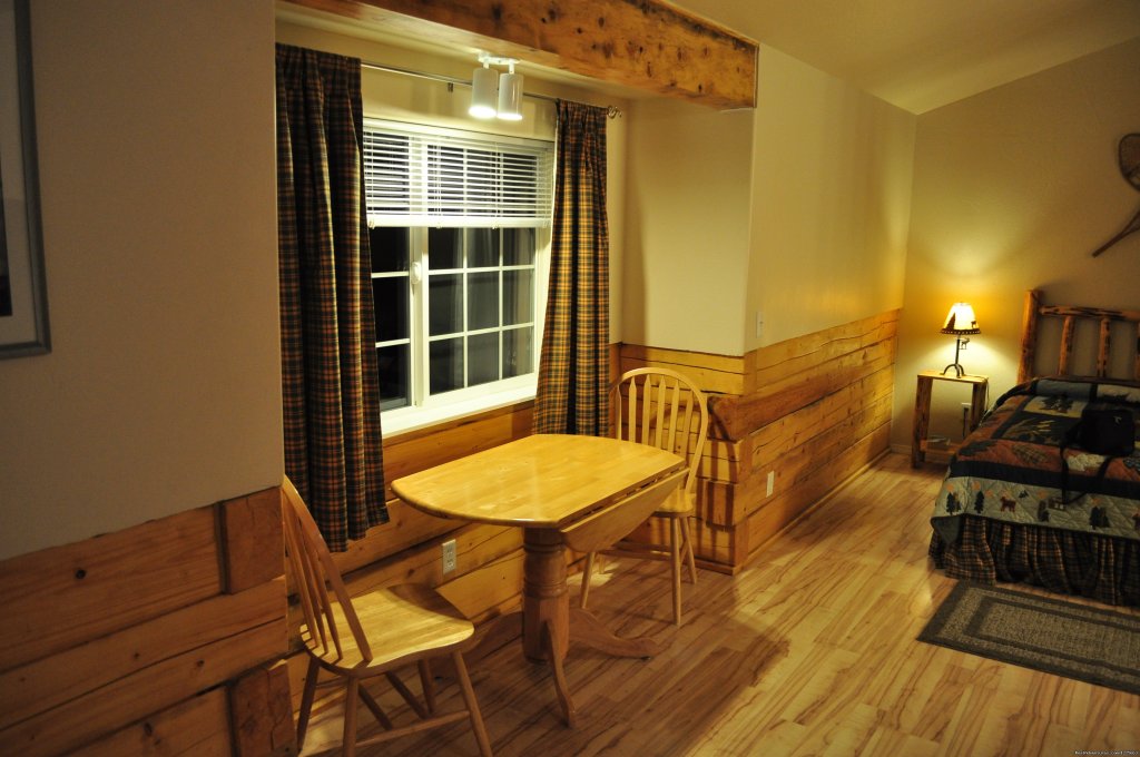 Nook With Table And Chairs | Denali Fireside Cabins & Suites | Image #4/14 | 